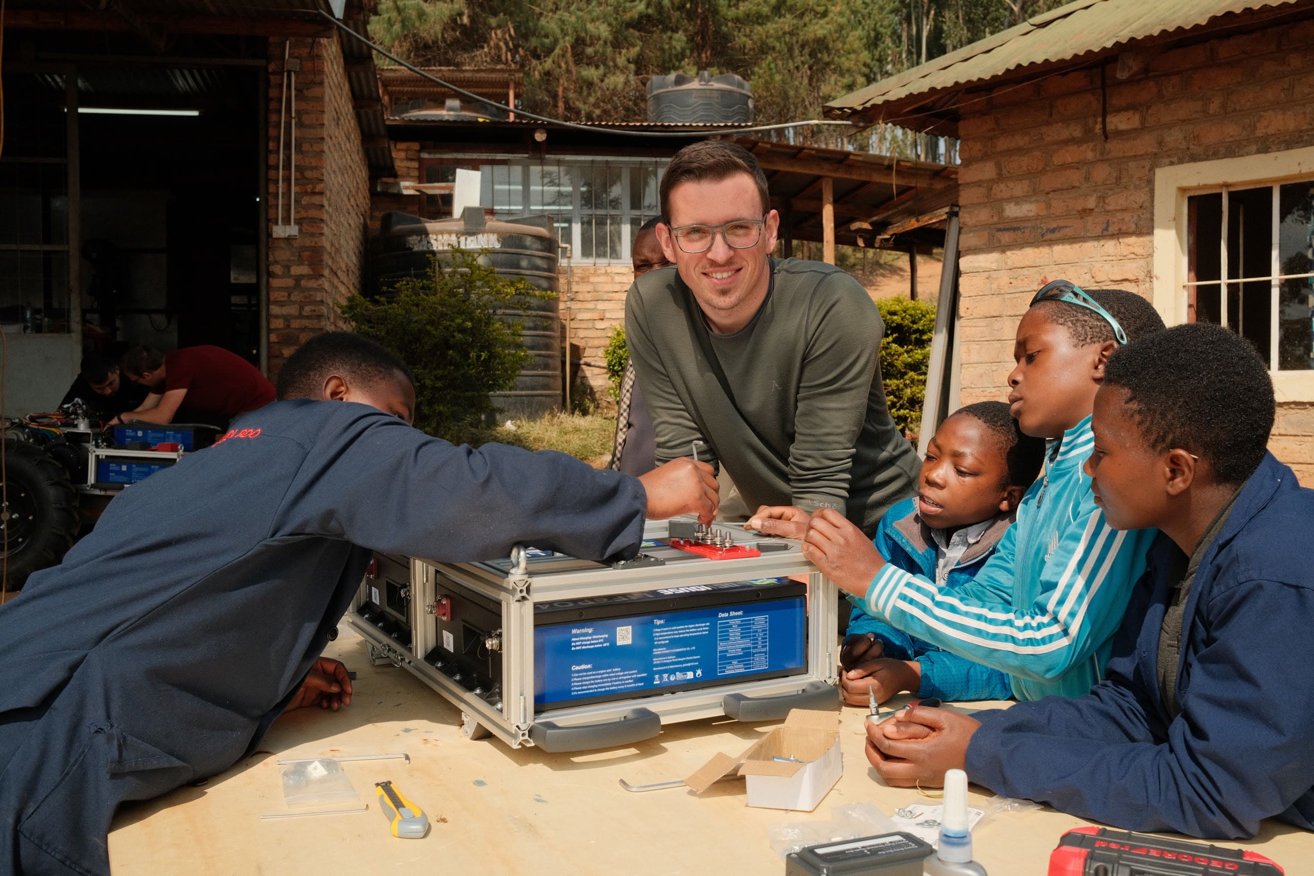 Training local technicians for decentralized micro-factory assembly in Tanzania